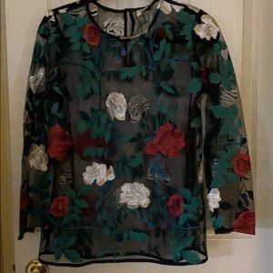 Ultra Pink brand embroidered tunic .